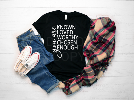 You are KNOWN LOVED WORTHY CHOSEN ENOUGH on a Black Graphic Tee